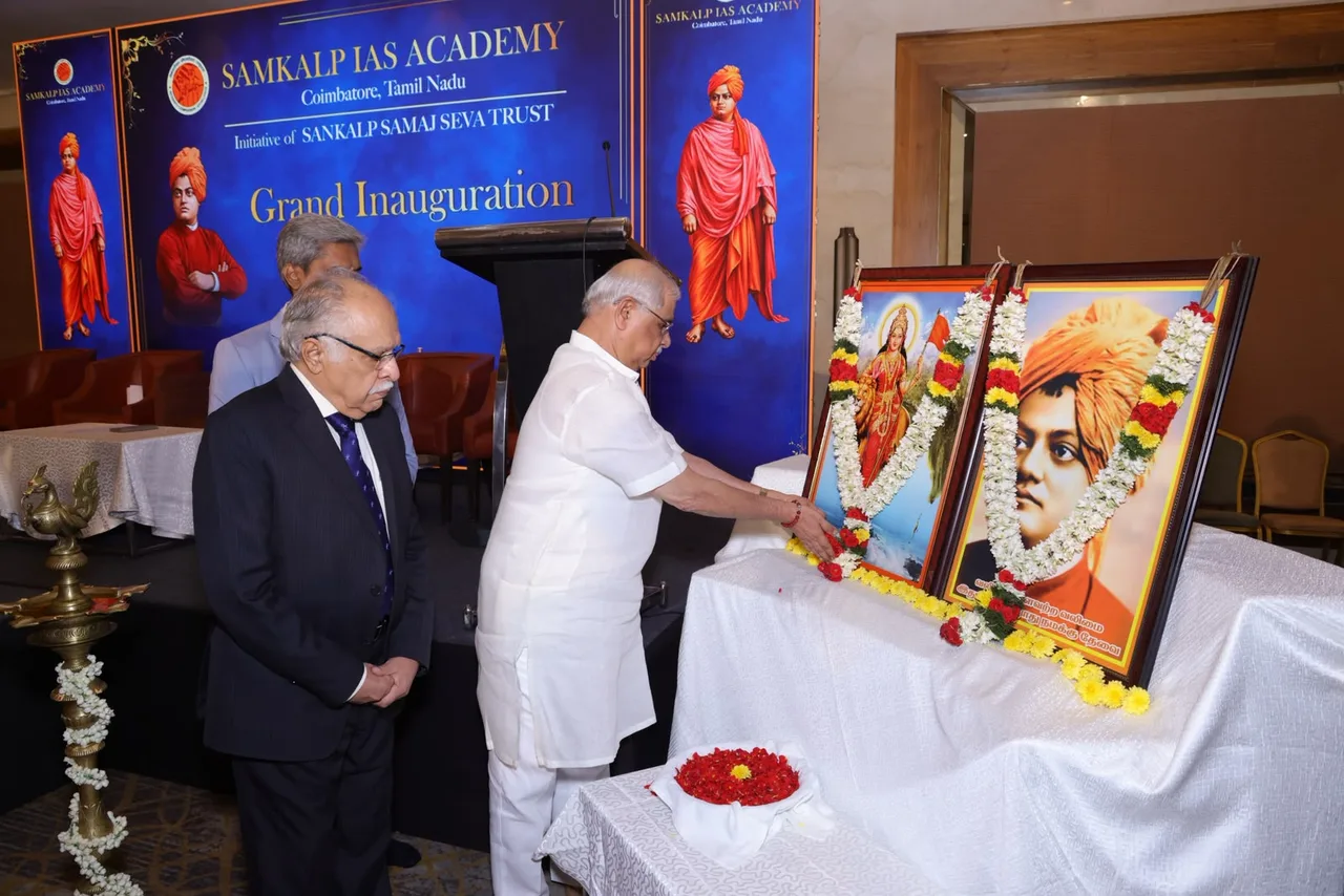 Chief Guest Honourable Dr. Rajendra Vishwanath Arlekar, Governor of Tamil Nadu, offering flowers at the portraits of Swami Vivekananda and Bharat Mata during the Grand Inauguration of Samkalp IAS Academy Coimbatore.