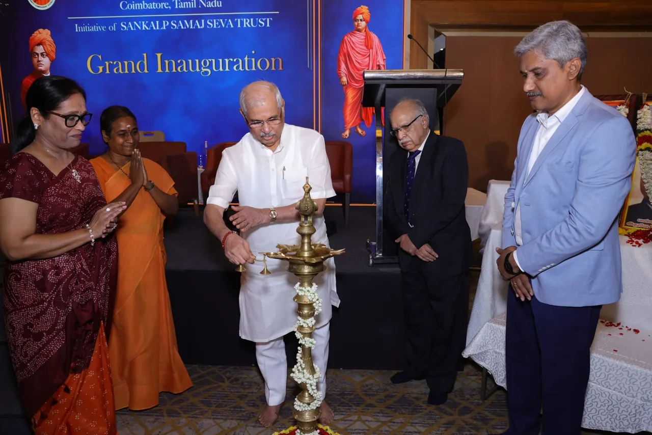 Chief Guest Honourable Dr. Rajendra Vishwanath Arlekar, Governor of Tamil Nadu, and dignitaries lighting the traditional brass kuthuvilakku lamp on stage at Samkalp IAS Academy Coimbatore.